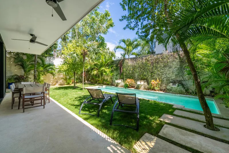 Shaded patio and private pool at a tropical vacation property
