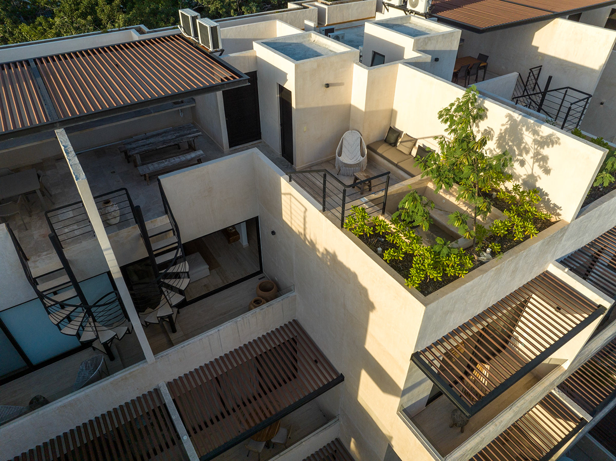 Aerial perspective of rooftop terraces and the surrounding architecture — Paramar